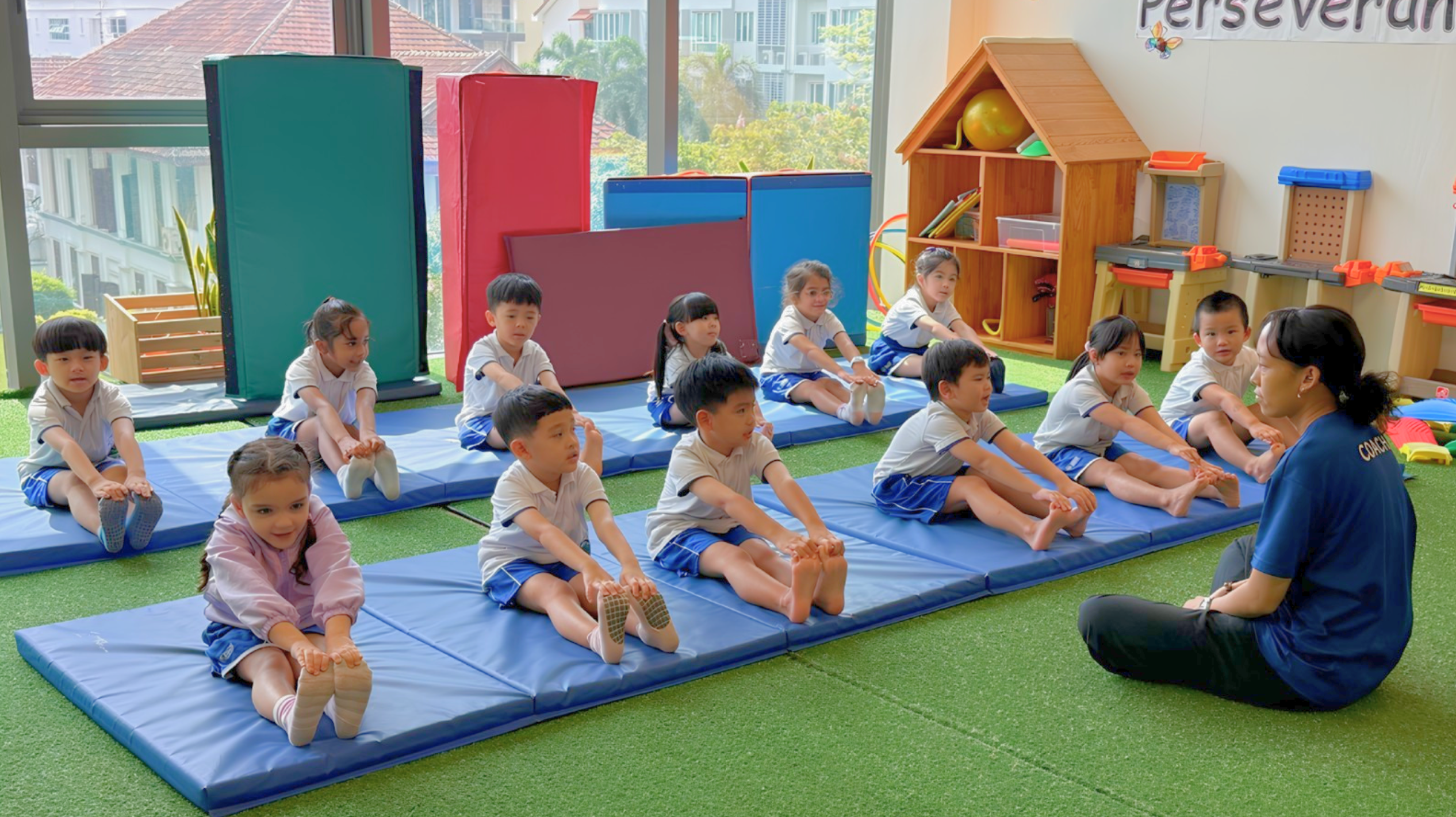 Children doing yoga at UWP